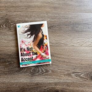 It's Not About the Accent by Caridad Ferrer, Paperback Book